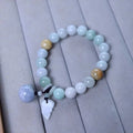 Natural jade bracelet with a choice of hanging charms: apple, double apple, money bag, gourd, or Maitreya Buddha.
