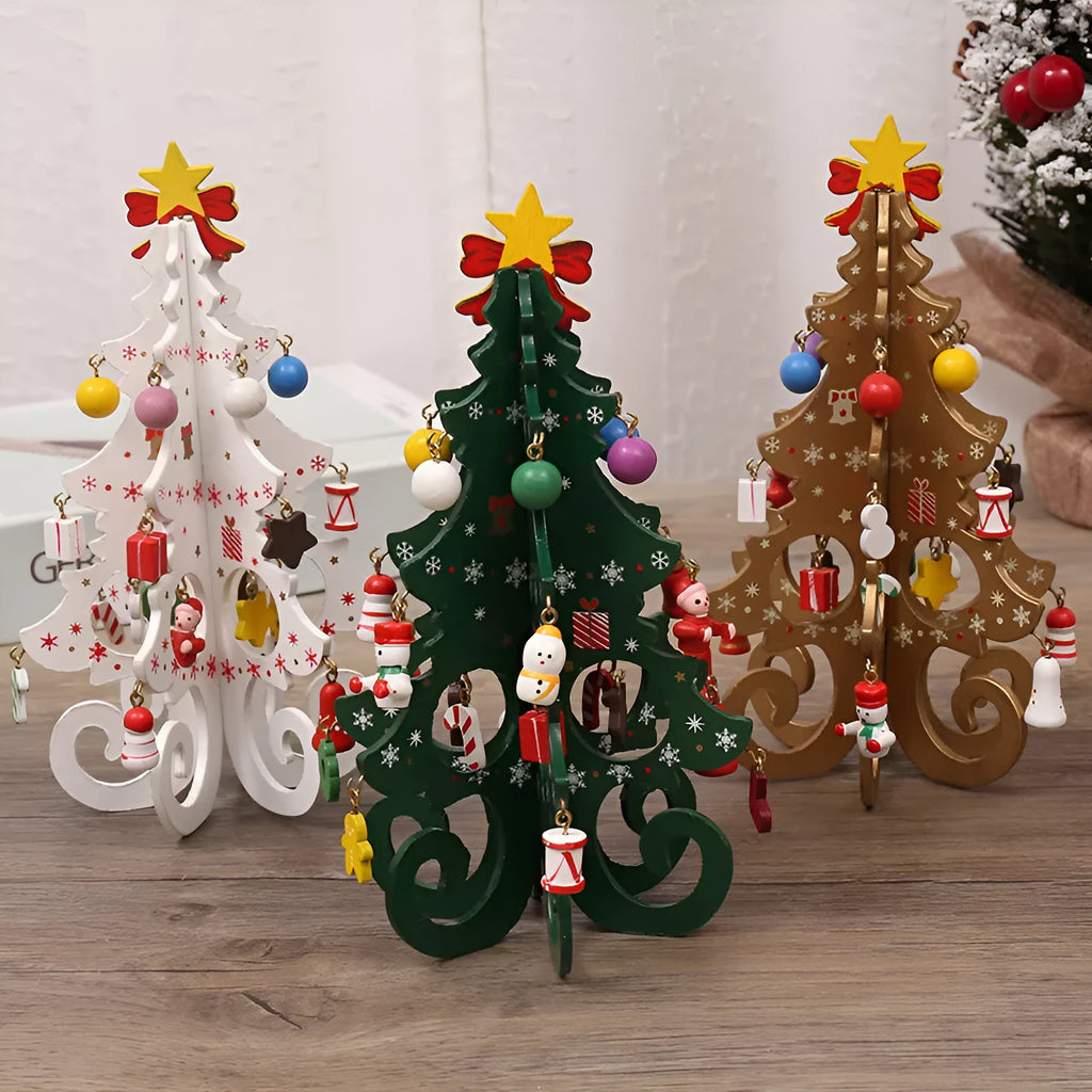 Green MDF Christmas tree ornament with laser-cut detail, 19x10.5cm, on a tree branch