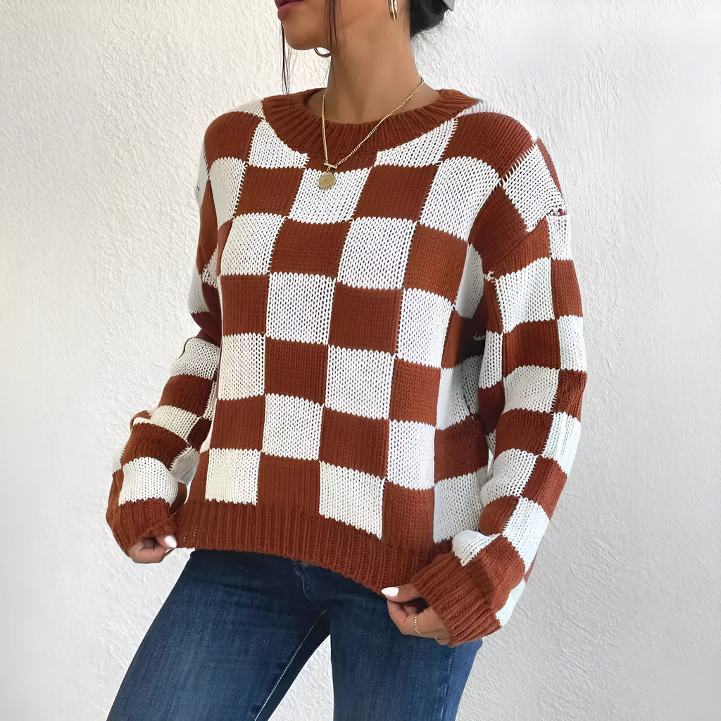 Dark brown plaid pattern on a loose-fitting acrylic pullover sweater with long sleeves