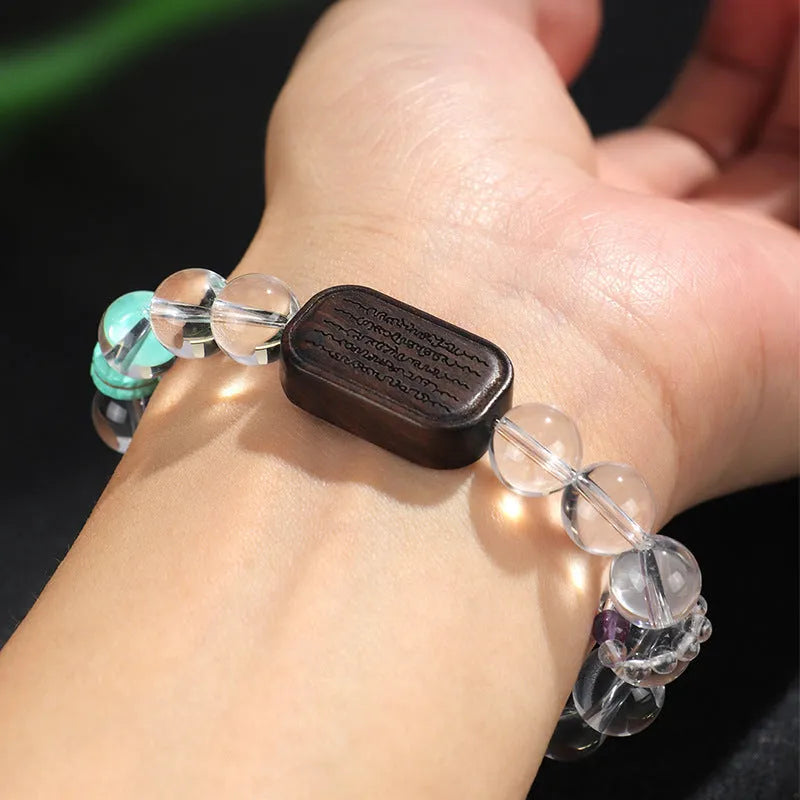 Natural white crystal ebony five warp bracelet on wrist showing handmade ethnic design