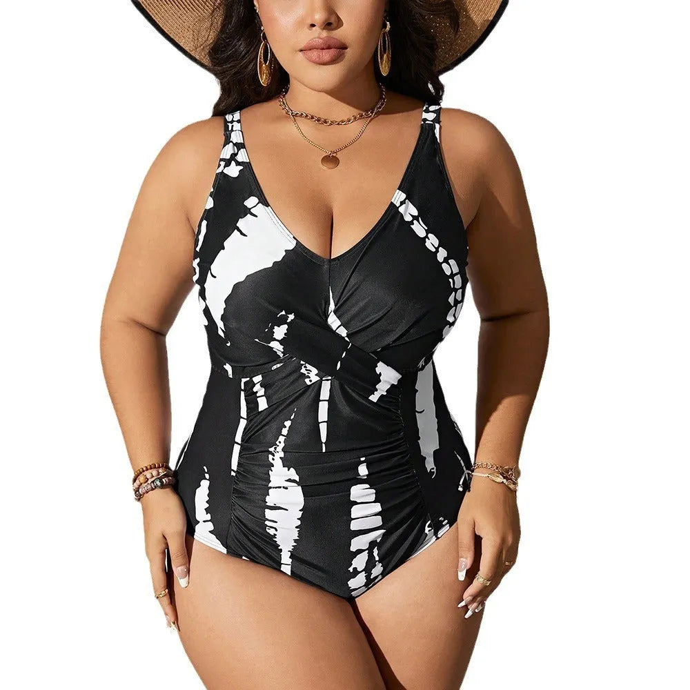 Black Siamese colour matching one-piece swimsuit on a hanger, showing sleeveless design.