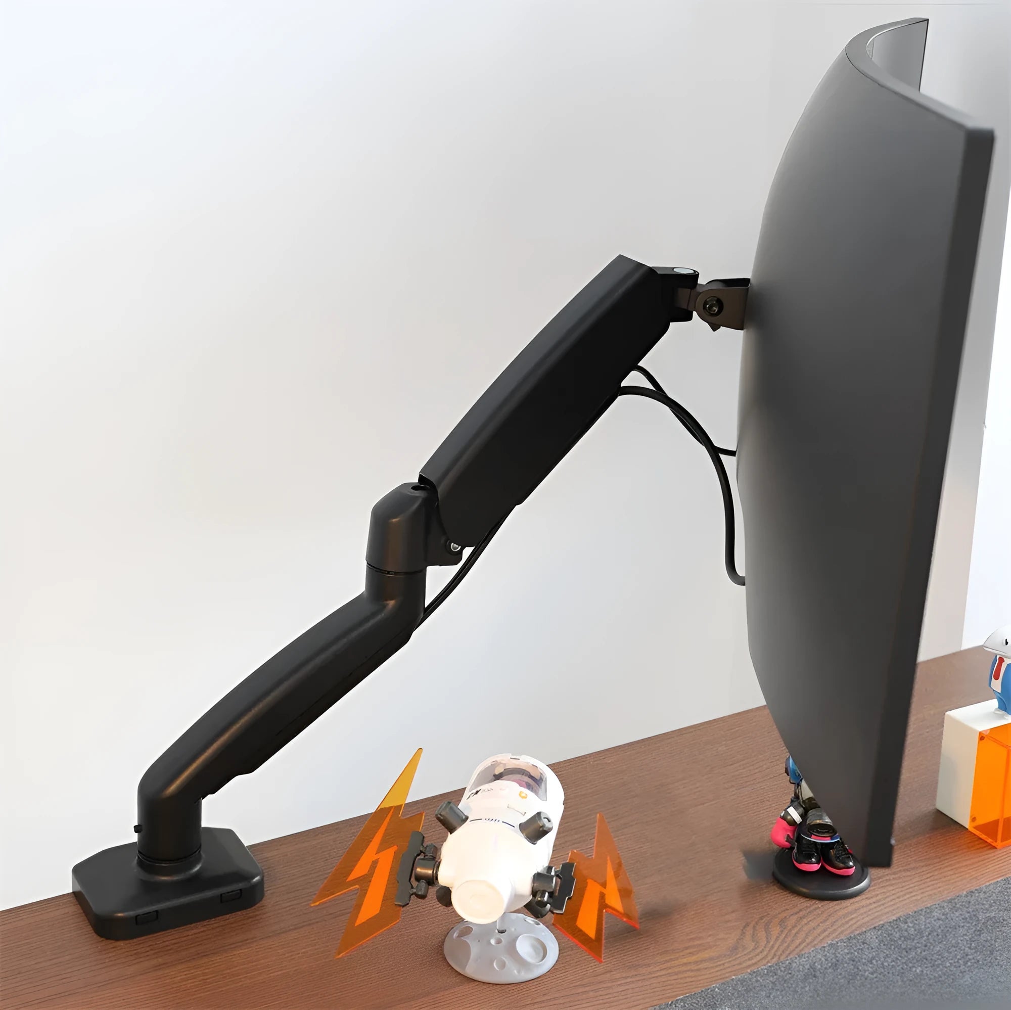 Black rotating telescopic LCD monitor bracket on table with adjustable height and 360-degree rotation