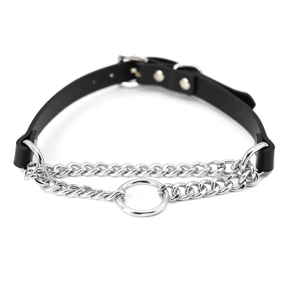 Black leather dog collar with chain tightening mechanism and matching leash on dark background