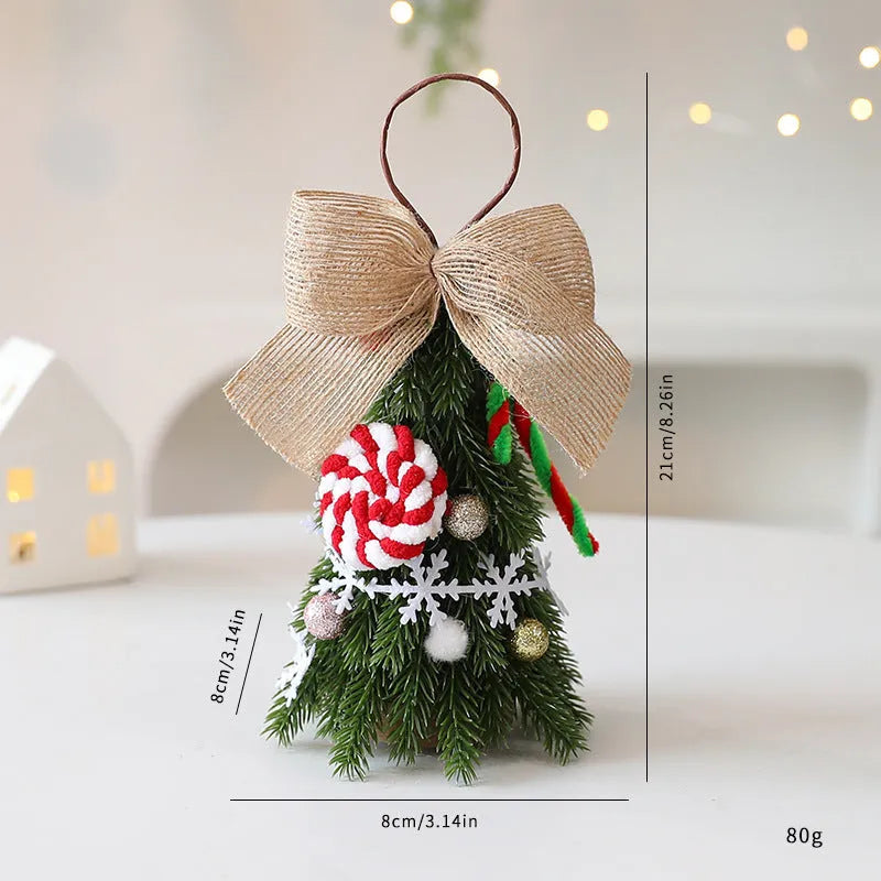 21cm PE foam mini Christmas tree ornament with red and white snowflake design, hanging on a tree branch