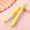 Mini hairdressing splint straightener for bangs and perm styling with storage box in choice of five colours.