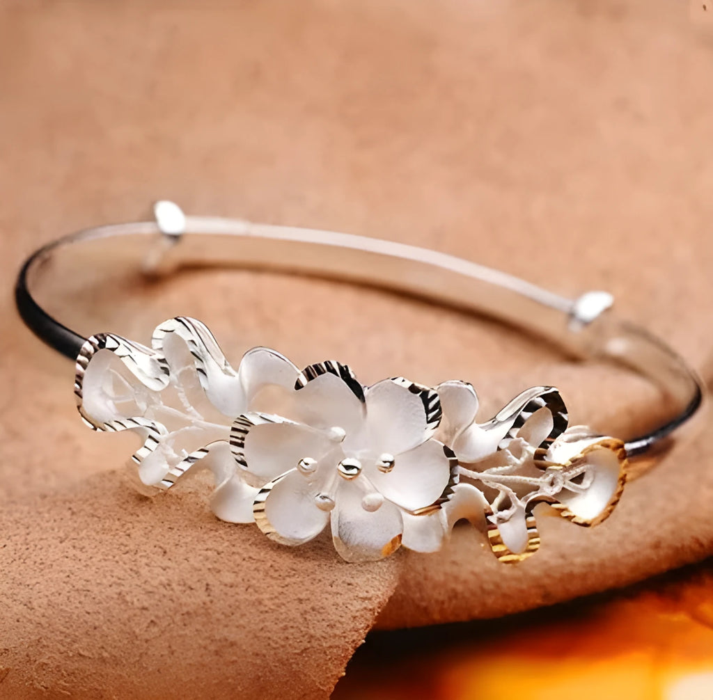 Sweet Bauhinia adjustable copper bracelet with floral bauhinia flower design for women