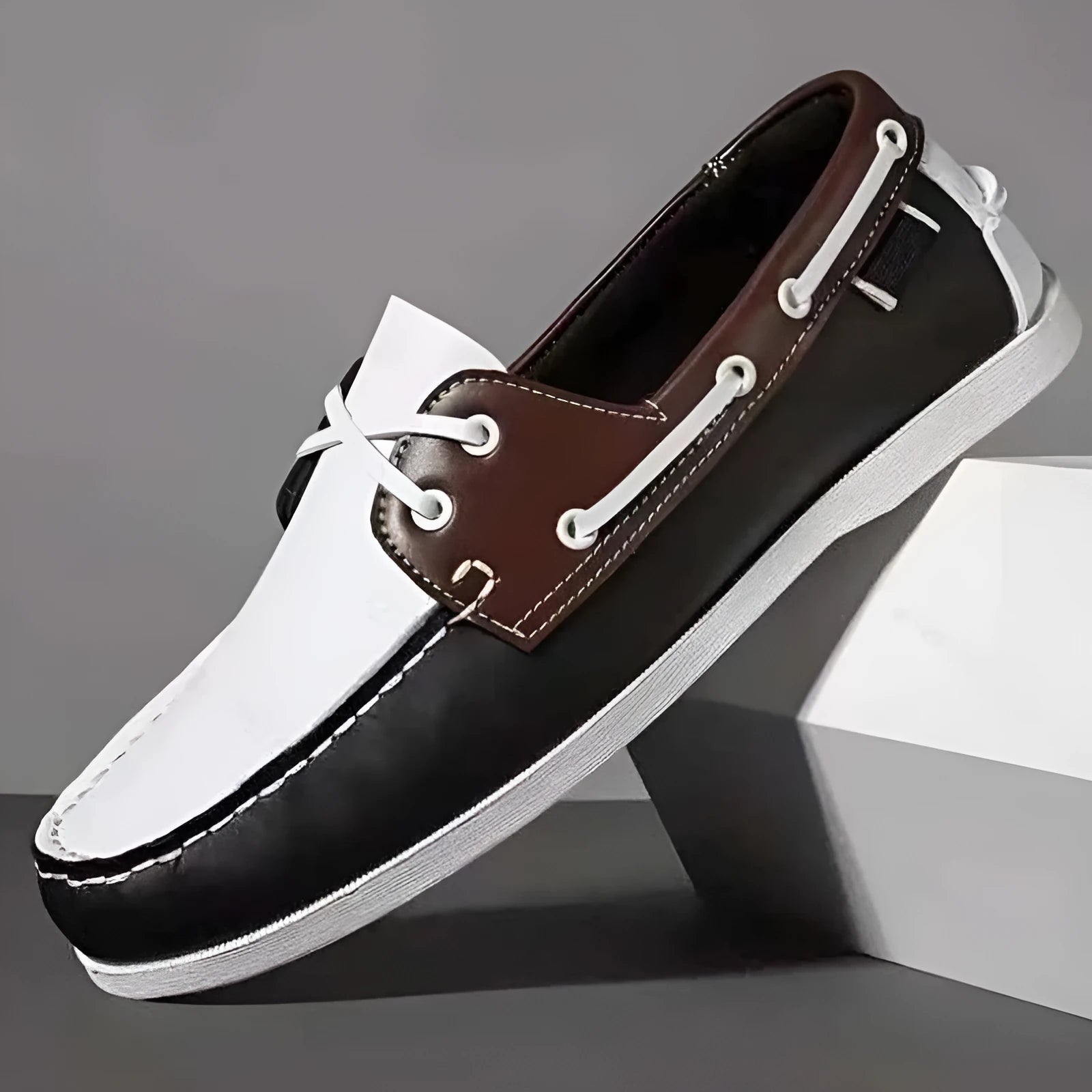 Men's British style casual shoe with round toe and flat heel, shown in a solid colour.