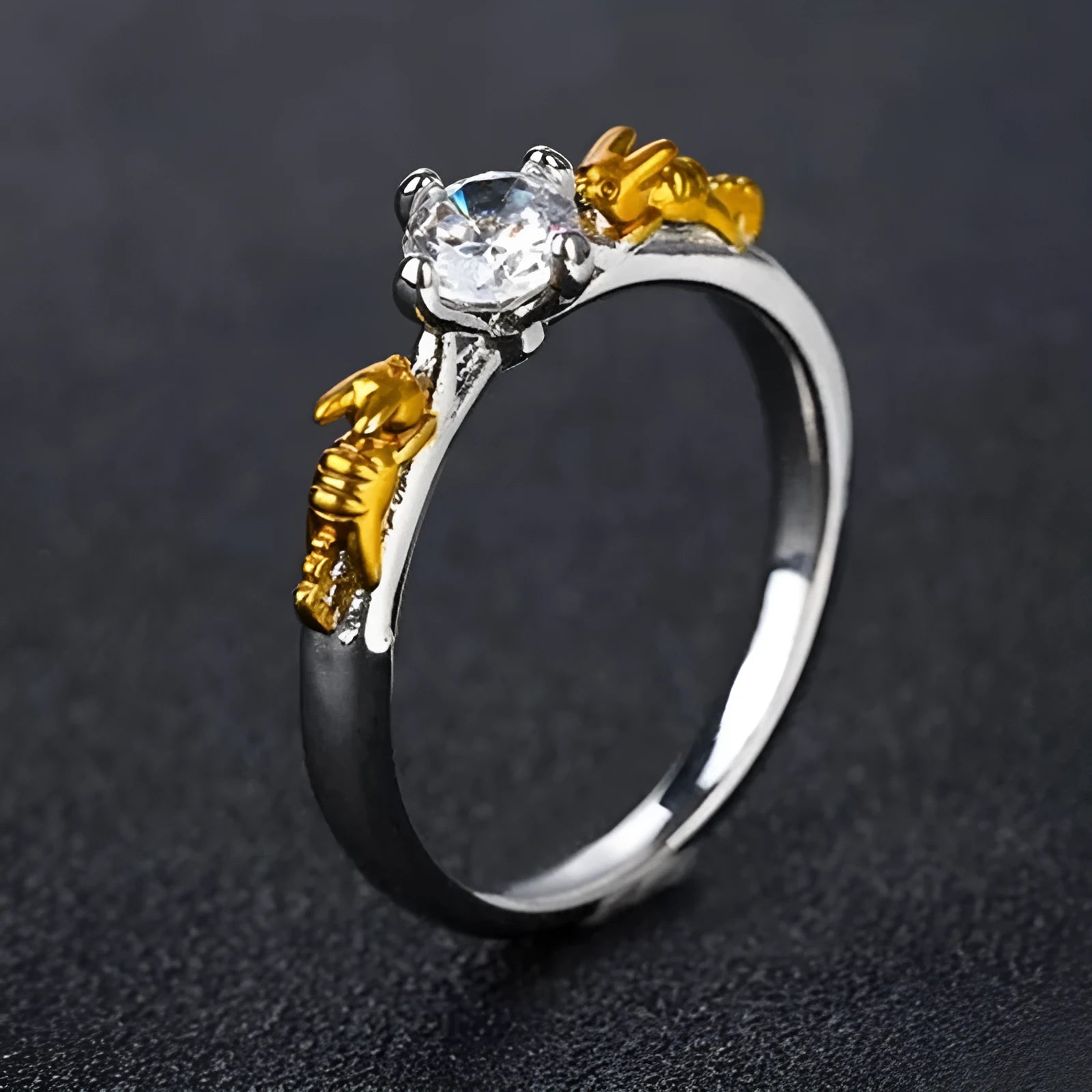 Copper crown fashion ring with black gold finish on a hand.