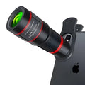 20x magnification cell phone telescope lens with universal clip and single eye mask on a smartphone.