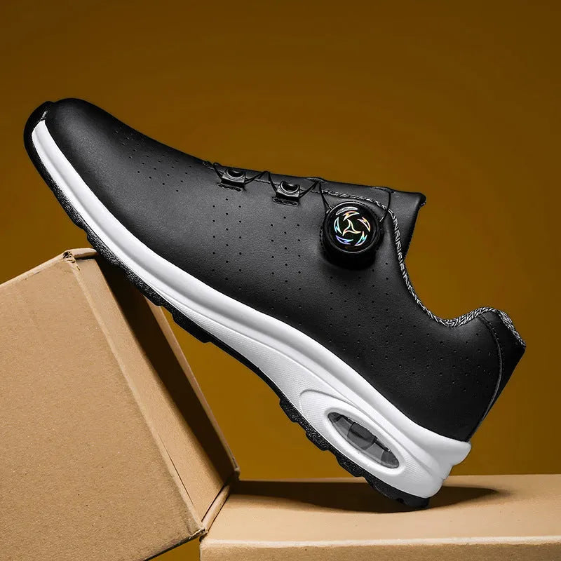 Women's low-top black mesh casual sneakers with white composite sole and lace-up closure.