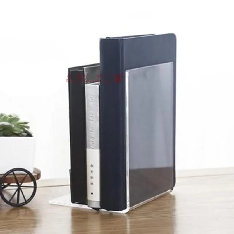 Clear transparent acrylic bookshelf displaying books on desk with smooth edges and minimalist design