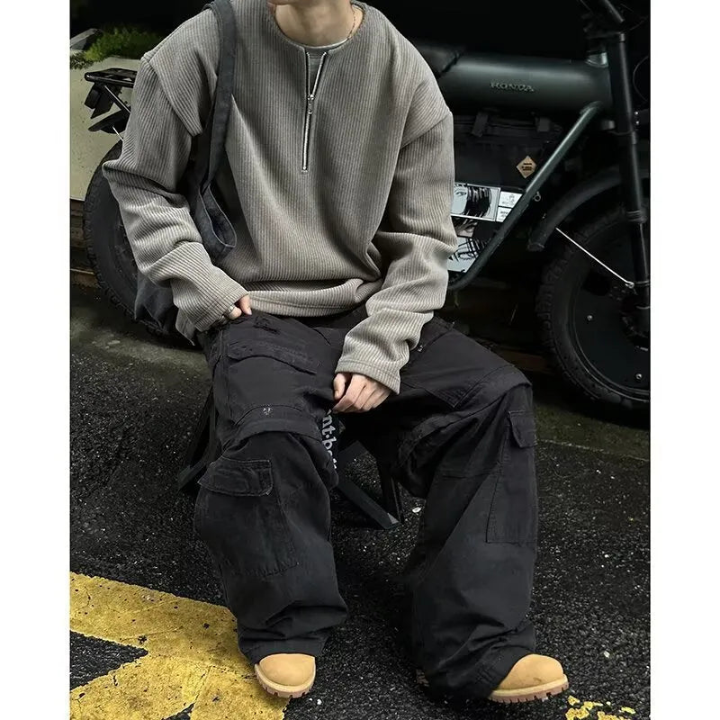Women's solid colour loose long sleeve pullover top in grey, black, or apricot with letter pattern.
