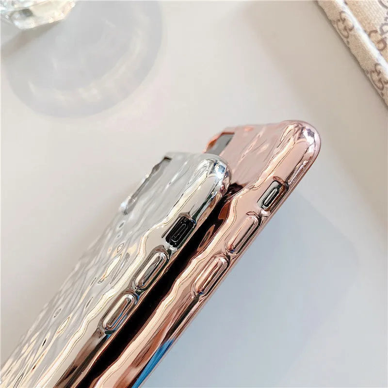 Rose gold electroplated TPU back cover case shown on an iPhone 15 Pro Max.