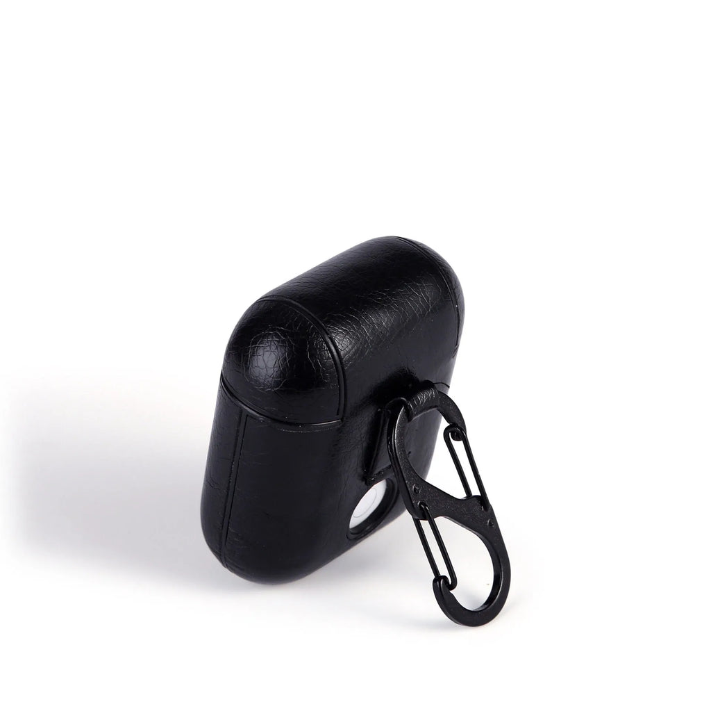 Genuine leather protective case for Apple AirPods charging case in black, brown, light brown, and red.