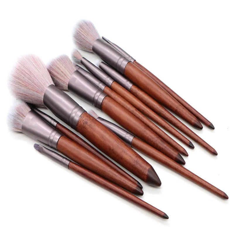 11-piece makeup brush set with synthetic hair heads, matte coffee aluminium ferrules, and natural wood handles