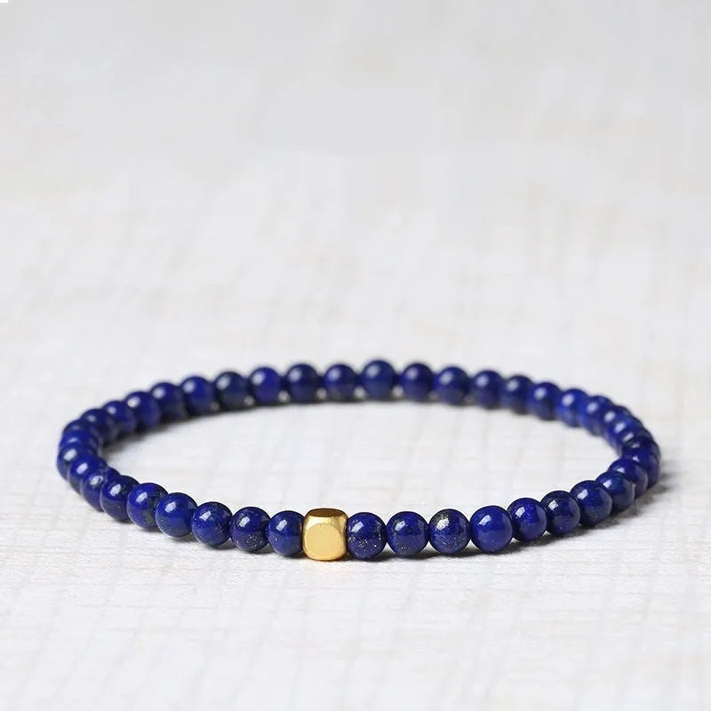 Women's green and gold natural crystal geometric bracelet with 16mm stone.