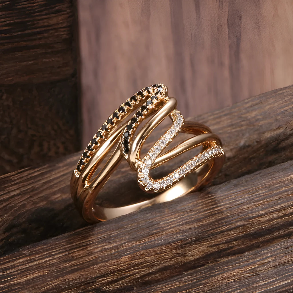 Close-up of a women's copper ring with micro-inlaid zircon stones and an electroplated finish.