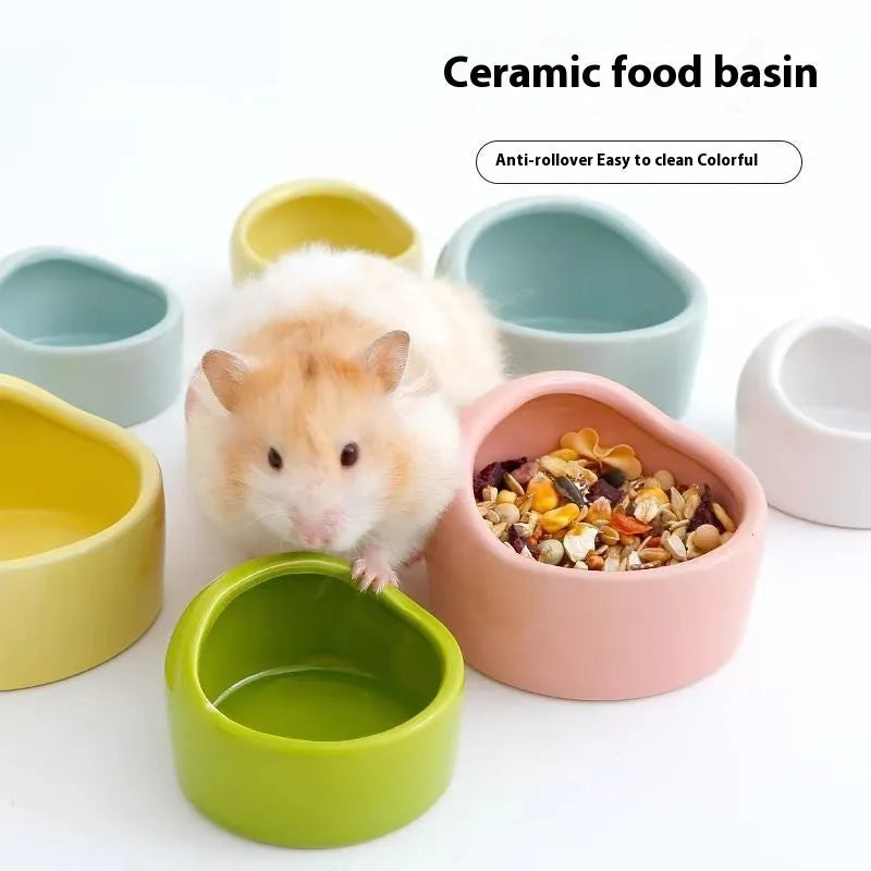 Small ceramic hamster food bowl in blue with a simple round basin design