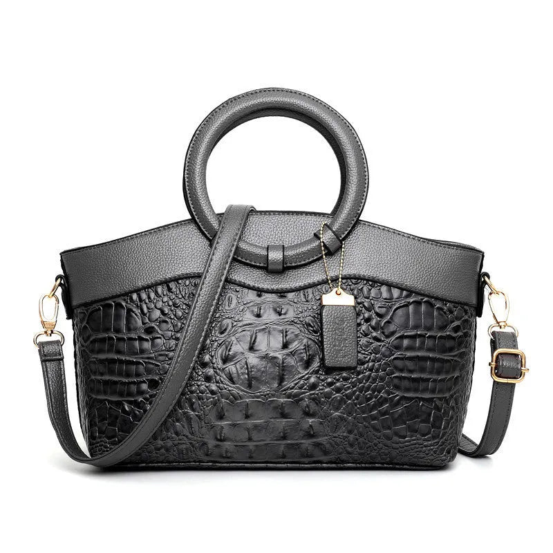 31cm wide fabric ladies shoulder handbag showing zipper compartments and available in six colour variations