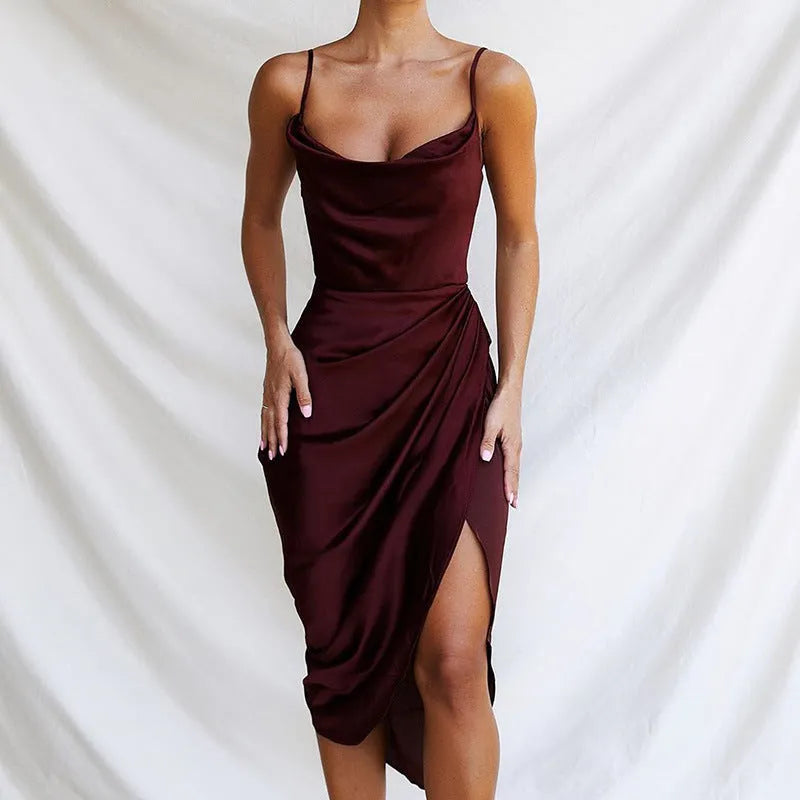Satin high-waist skirt with a thigh-high split, shown in black, on a model.