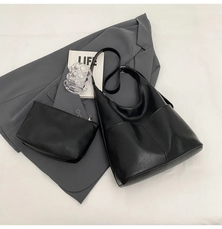 Women's large-capacity PU crossbody bag in coffee or black, 25cm high, 30cm wide, 12cm thick, with small bag.