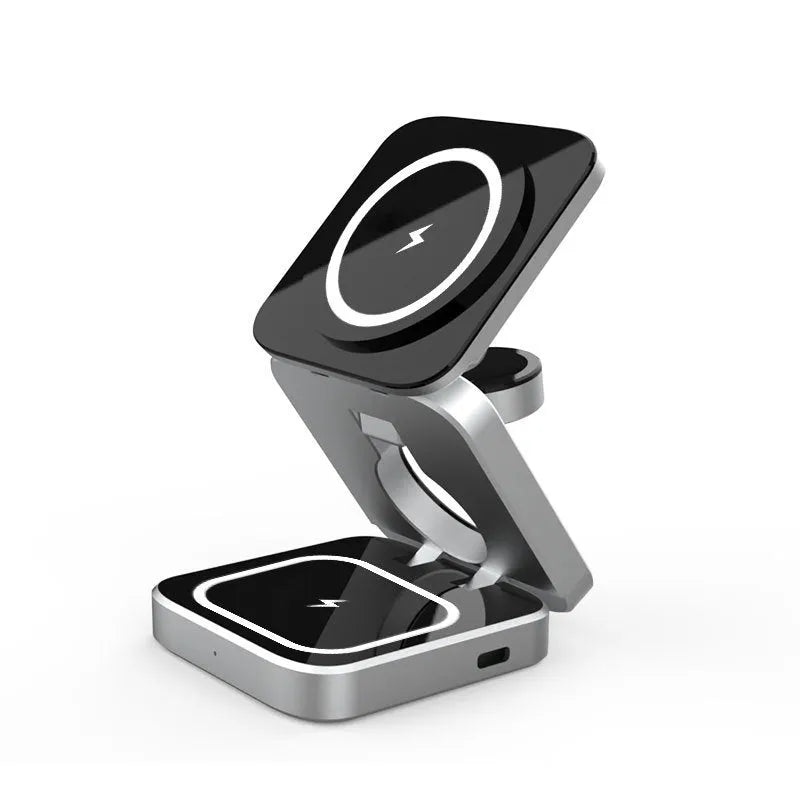 Folding three-in-one desktop wireless charging bracket with magnetic ring on a desk.