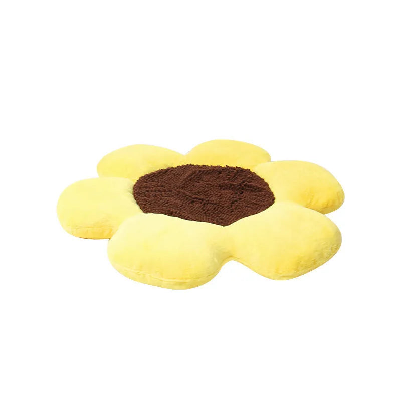 Blue round flower-shaped plush pet nest bed for cats on a wooden floor