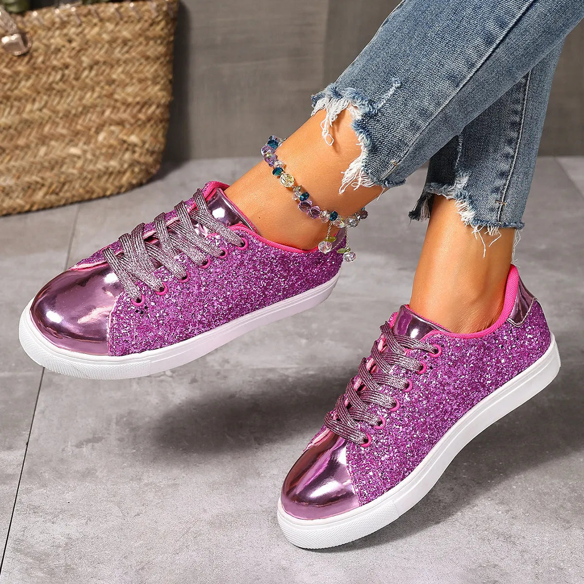 Women's plus size sequinned front lace-up board shoes in black, flat rubber sole.
