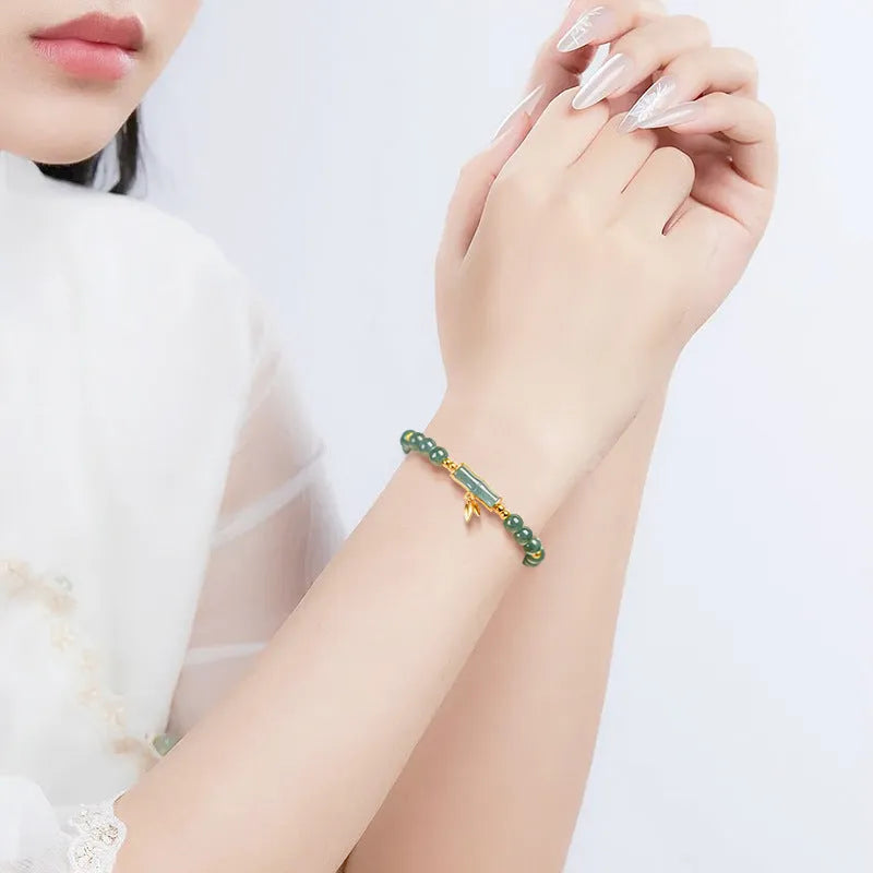 Women's blue water jade and S925 silver high-rise cargo bracelet with adjustable sizing