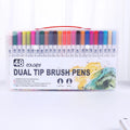Set of dual-tip watercolour brush pens with flexible brush nibs and fine points, arranged by colour.