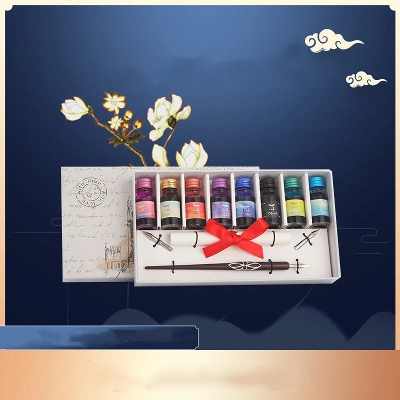 Wooden dip pen calligraphy set with coloured ink bottles in a wooden presentation box