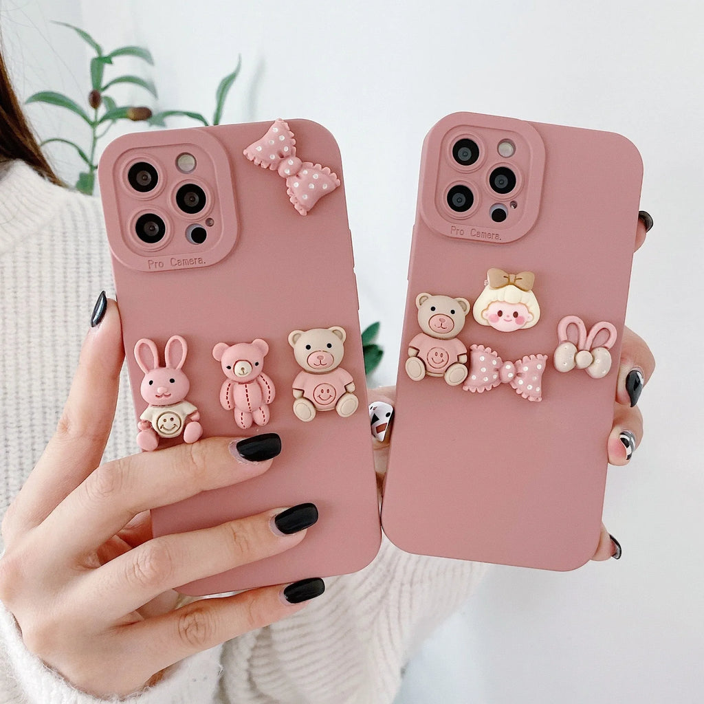 Women's decorative iPhone case with a raised three-dimensional doll bear design on a TPU protective cover.