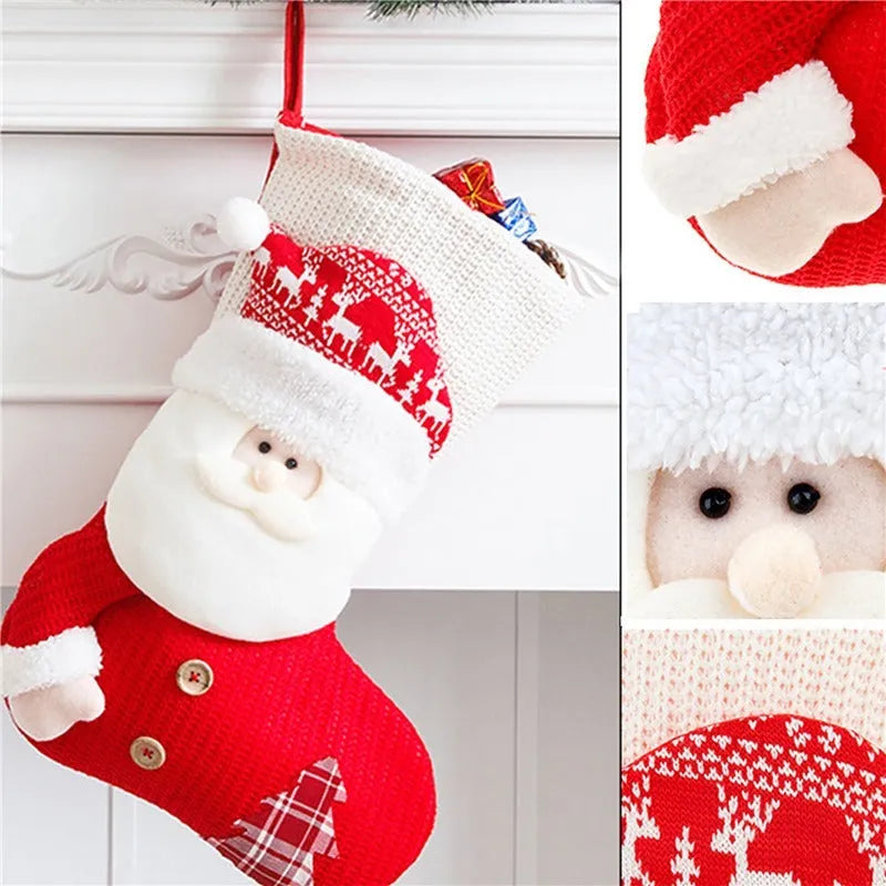 Large red and white knitted Christmas stocking with Santa Claus design hanging on a fireplace.