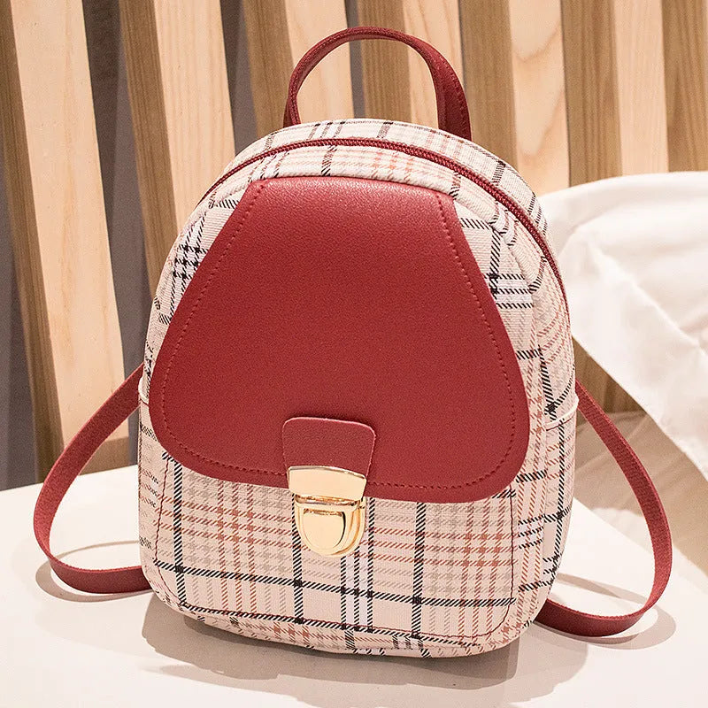 A one shoulder diagonal phone bag in PU material, shown in one of five colour options.