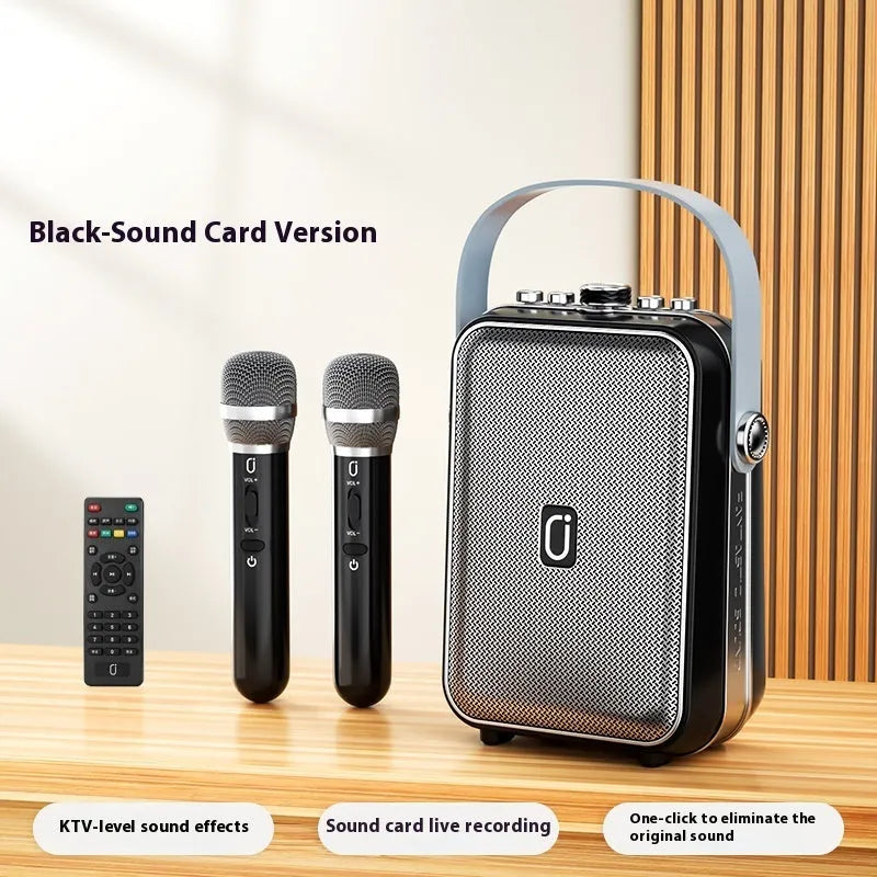 Outdoor karaoke Bluetooth speaker with dual wireless microphones in black, portable lithium battery design