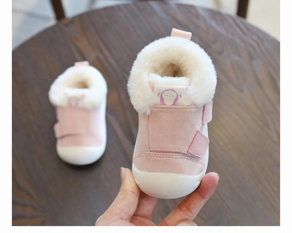 Children's velvet toddler shoes in various colours, showing non-slip sole and soft upper.