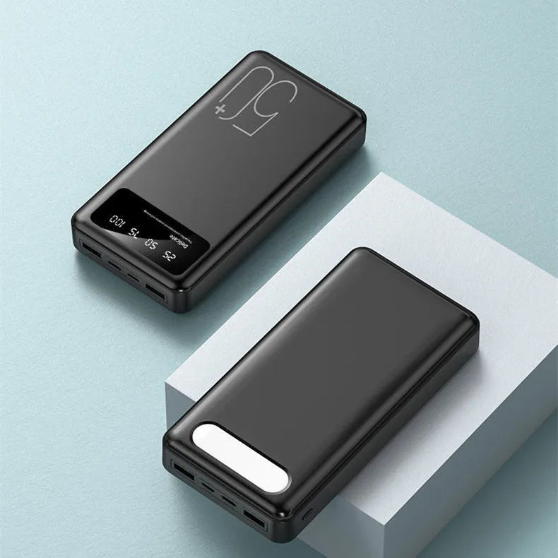 50000 mAh portable power bank with LED display and fabric texture finish in black or white