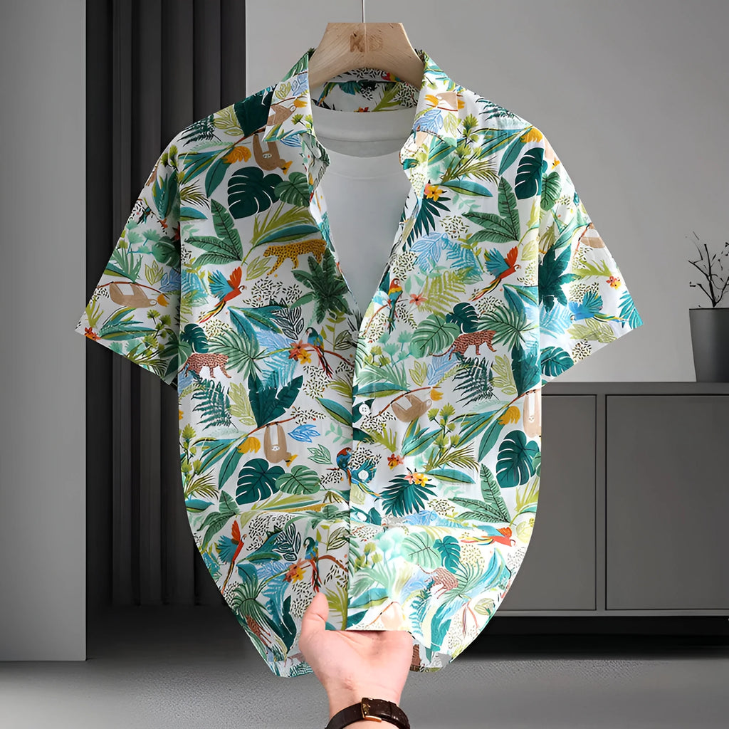 Men's short sleeve cotton shirt with colourful Hawaiian floral print, cardigan style, on a hanger.
