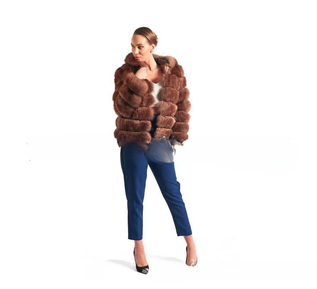 Loose-fitting women's hooded coat in artificial fur, shown in brown and silver fox colours.