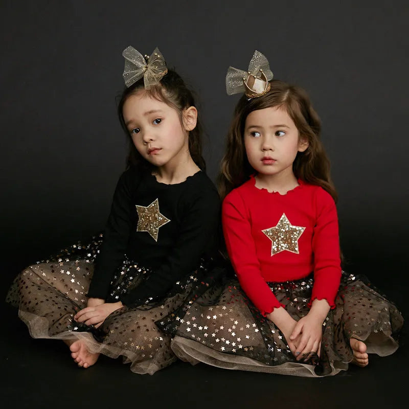 Red cotton long sleeve princess dress for a young girl with lace and bow details for Christmas.