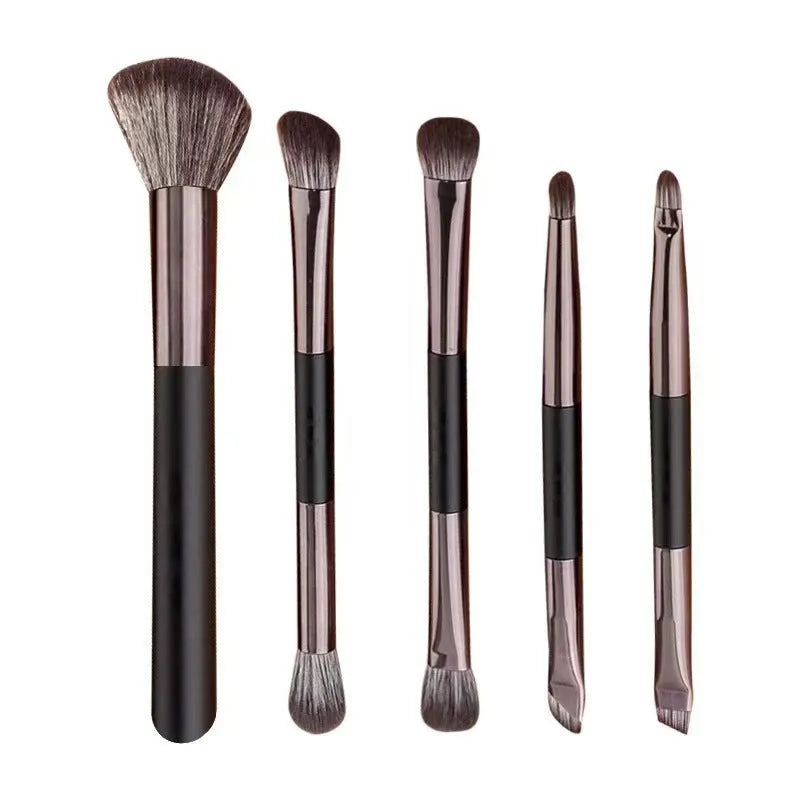 Makeup brush set with mirror showing artificial fibre bristles and plastic handles