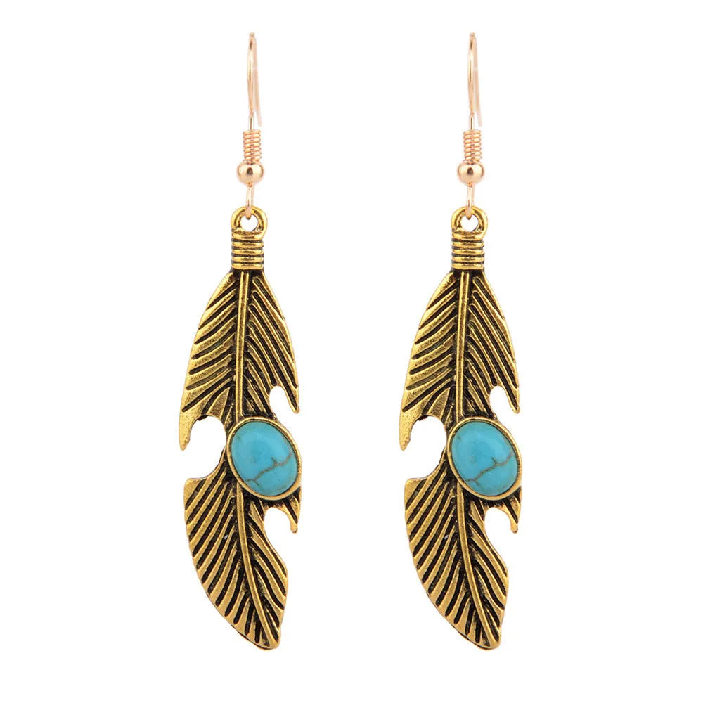 Vintage feather earrings with turquoise inlay leaf pattern in antique gold