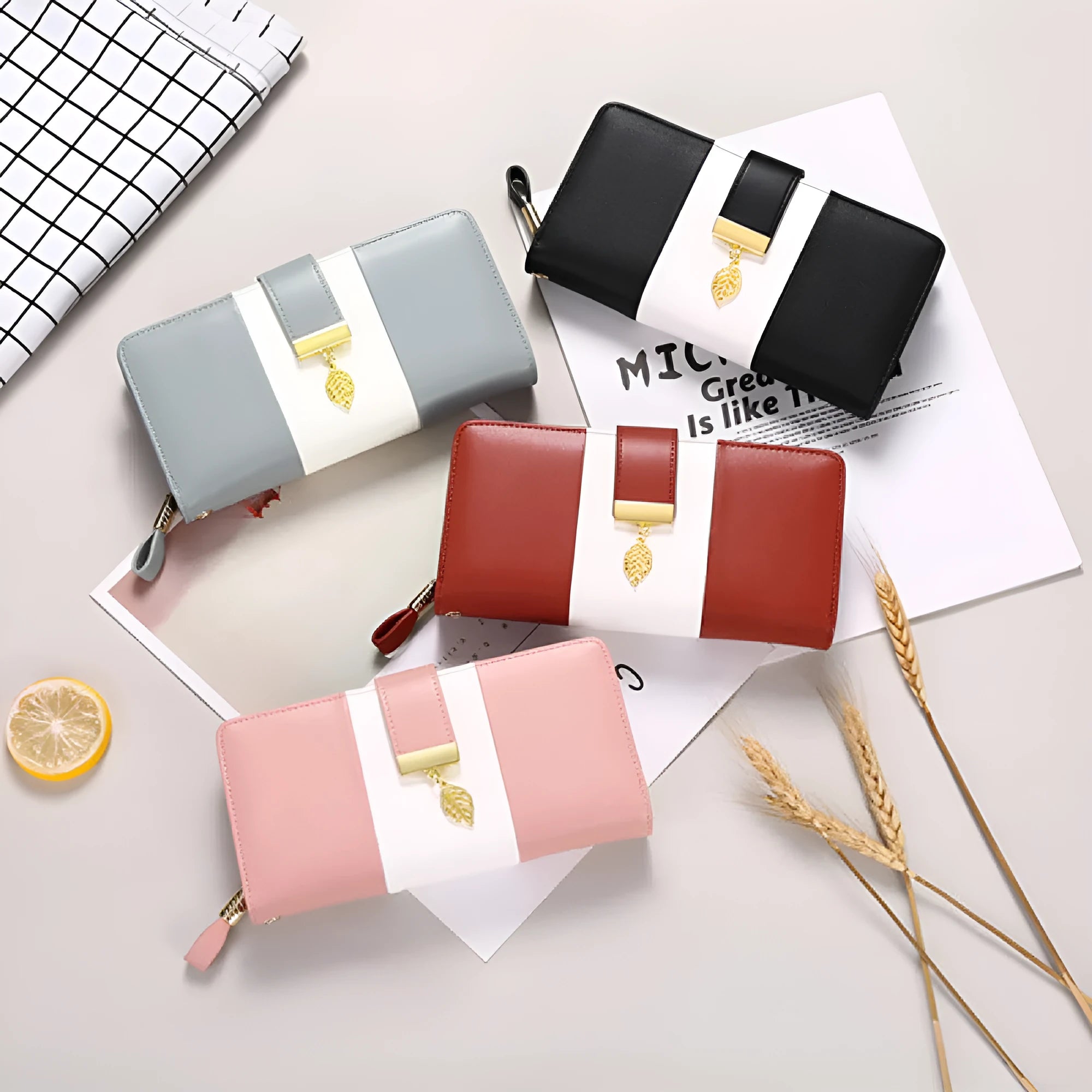 PU leather anti-theft clutch handbag with lock closure in black, showing its compact size.
