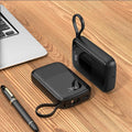 Portable power bank in black 10000mAh polymer lithium battery multi-U port output plastic shell