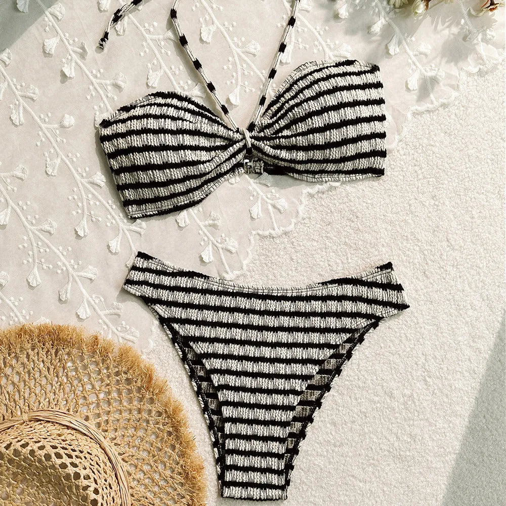 Pink and black striped women's bikini swimsuit with split design and matching briefs