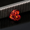 Colourful heart-shaped moissanite stone in lemon yellow with precise facets for jewellery making