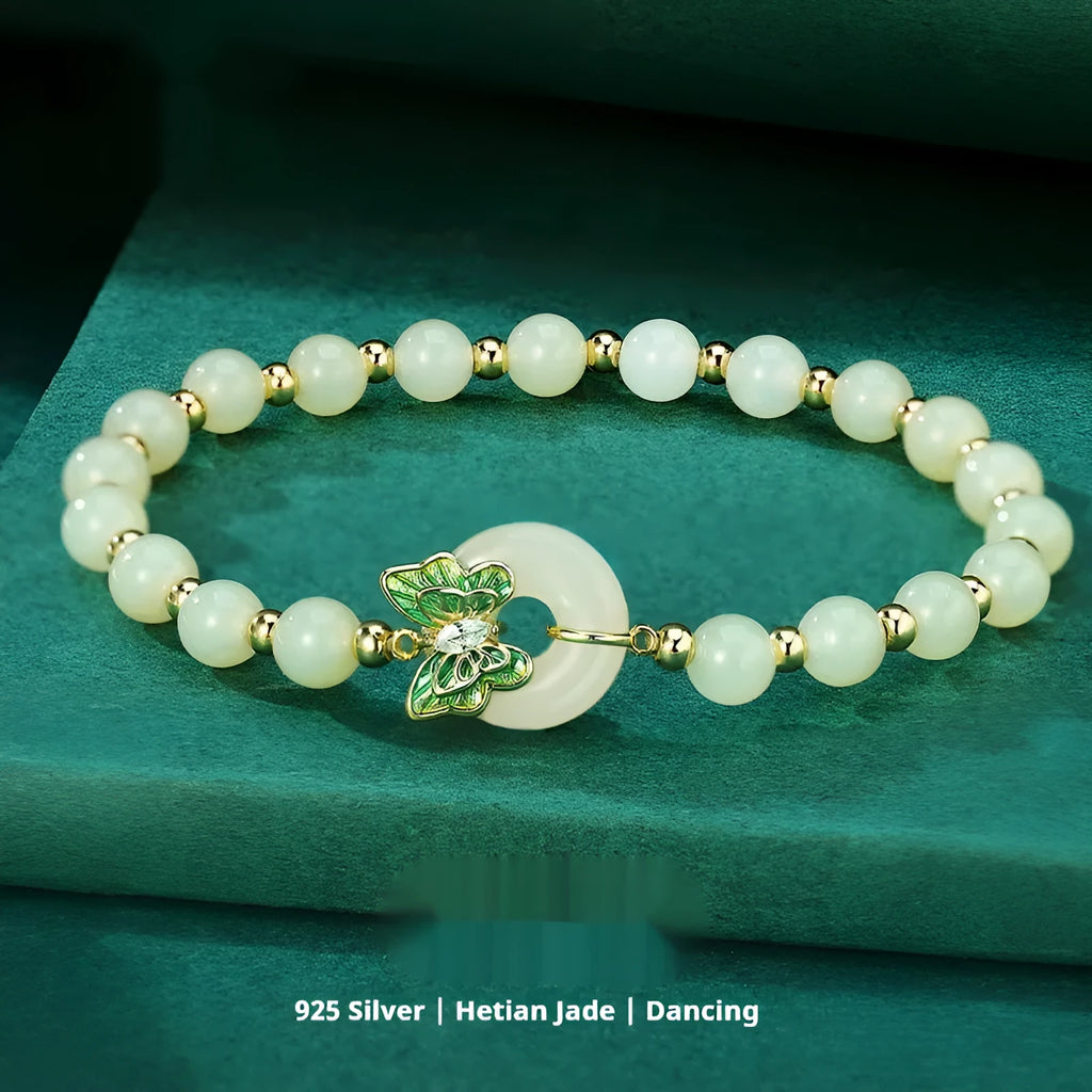 Cyan Hetian Jade bracelet with sterling silver butterfly design, 6mm beads.