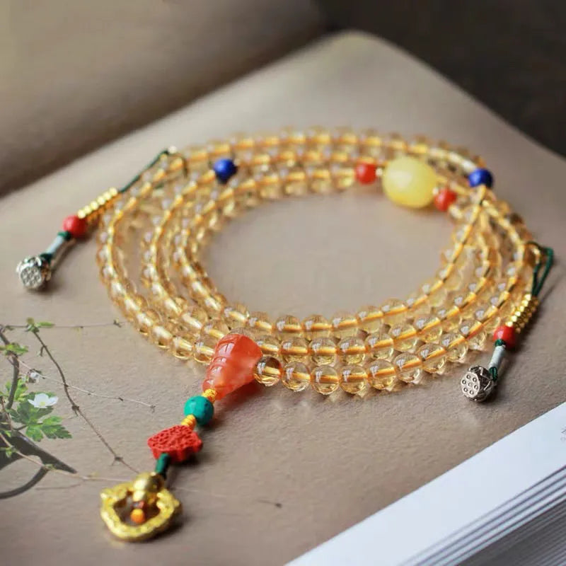 Brazil natural citrine bracelet with 1mm yellow beads on filament string