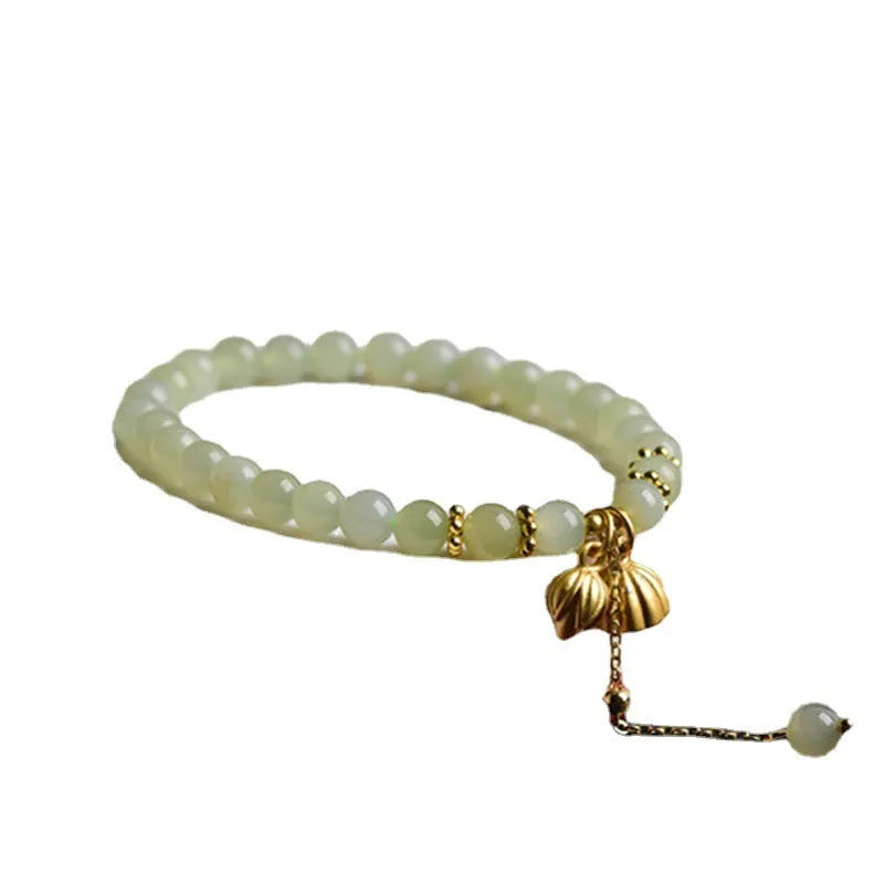Natural Hetian jade bracelet with 6mm lotus beads and fu character element