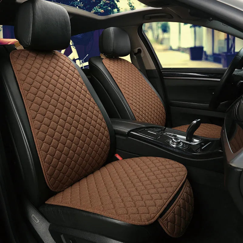 A linen universal car seat cushion shown in a classic black colour variant.
